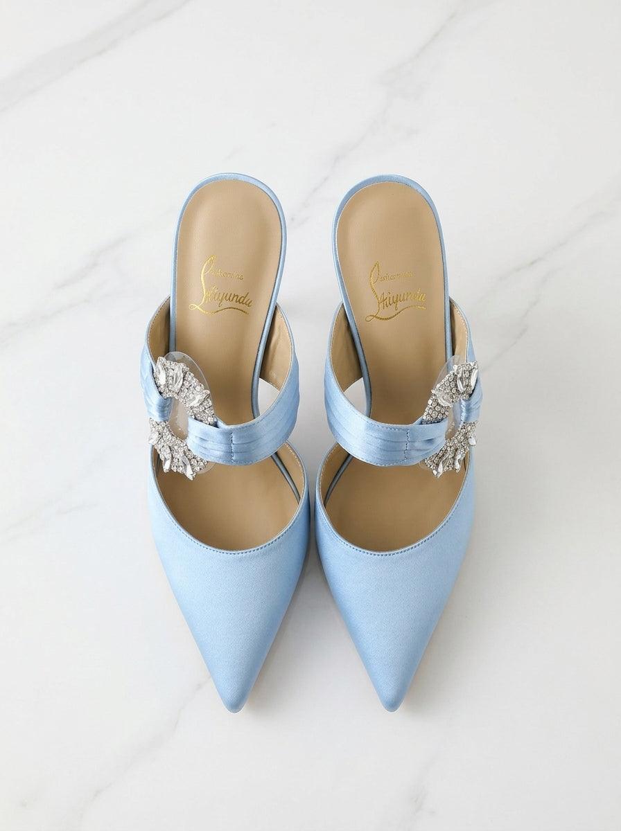 Pair_of_shoes_on_marble_202605031155 - VeroMarka