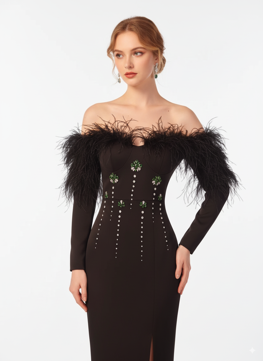 Woman wearing a black off-shoulder dress with feather details on a white background