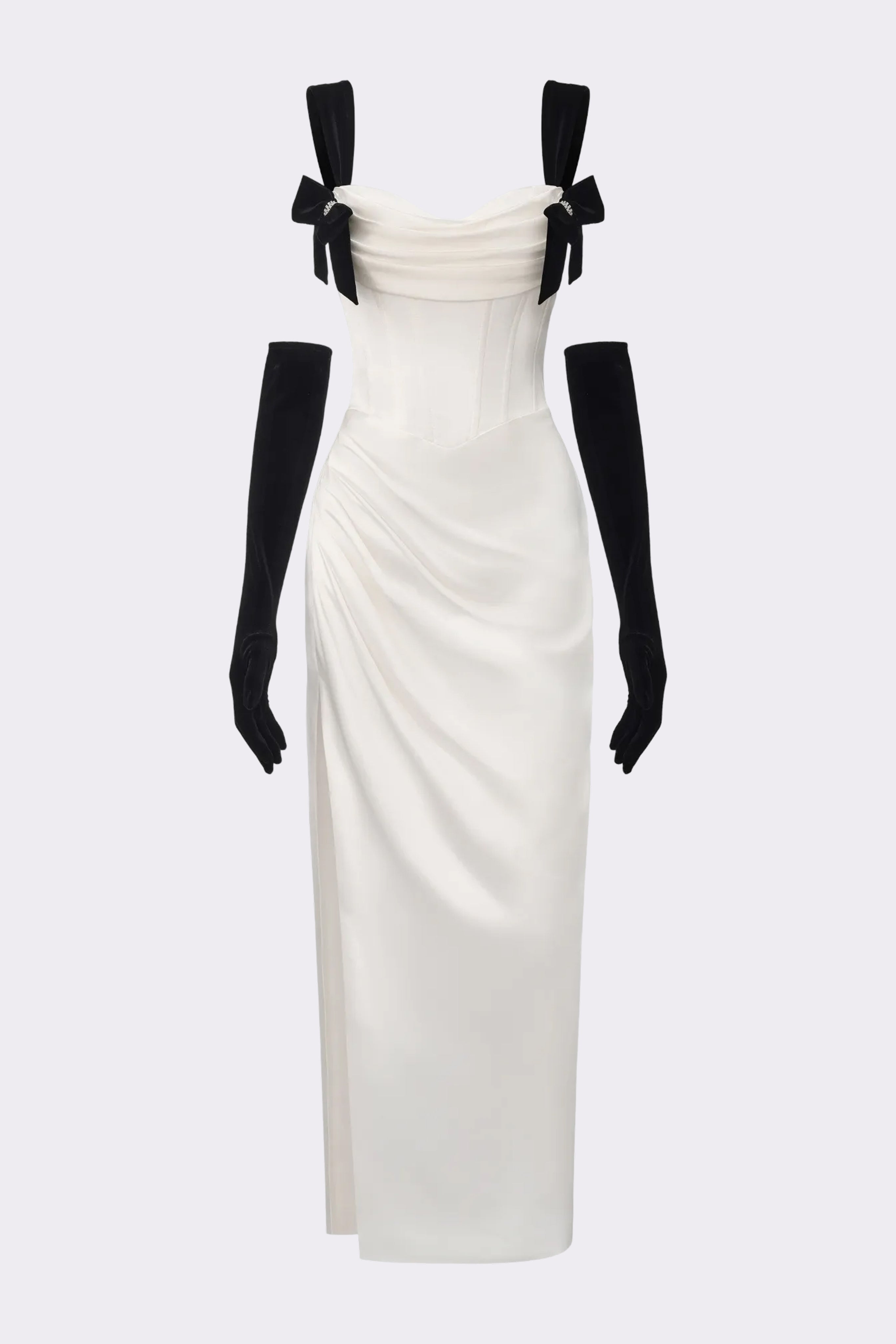 White evening gown with black bow straps on a white background