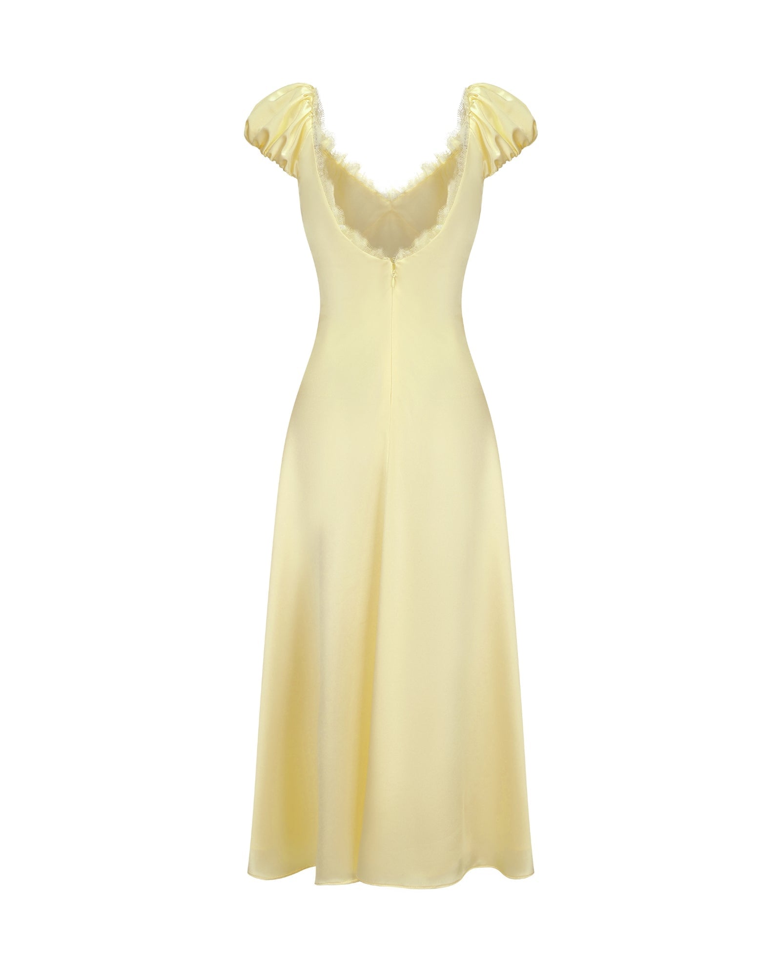 Yellow evening gown with floral straps on a white background