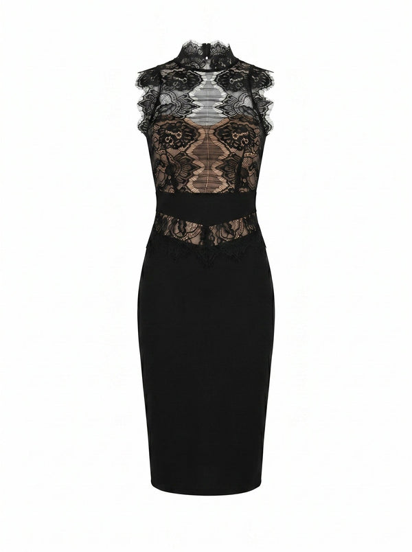 Black dress with lace detailing on a white background