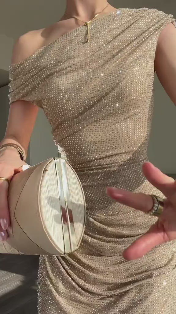 Champagne gold sparkly draped one-shoulder dress with a round clutch, close-up video, VeroMarka