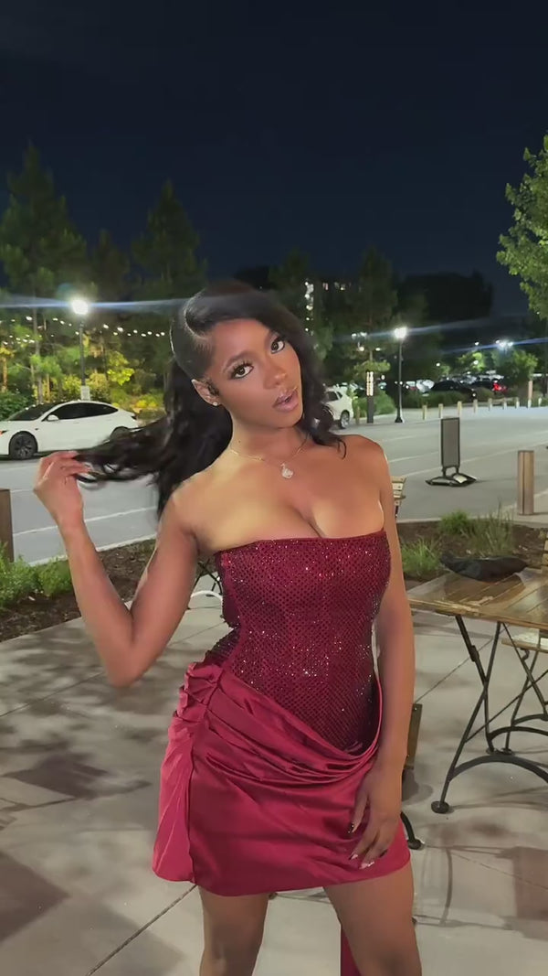 Woman in a burgundy satin strapless mini dress at night, styling video, VeroMarka