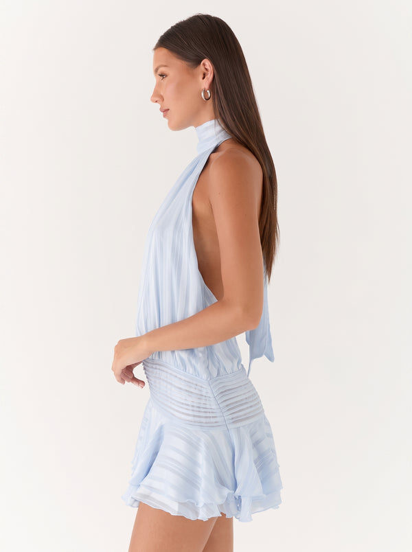 Backless Halter Ruffle Mini Dress in powder blue, side view on model, VeroMarka