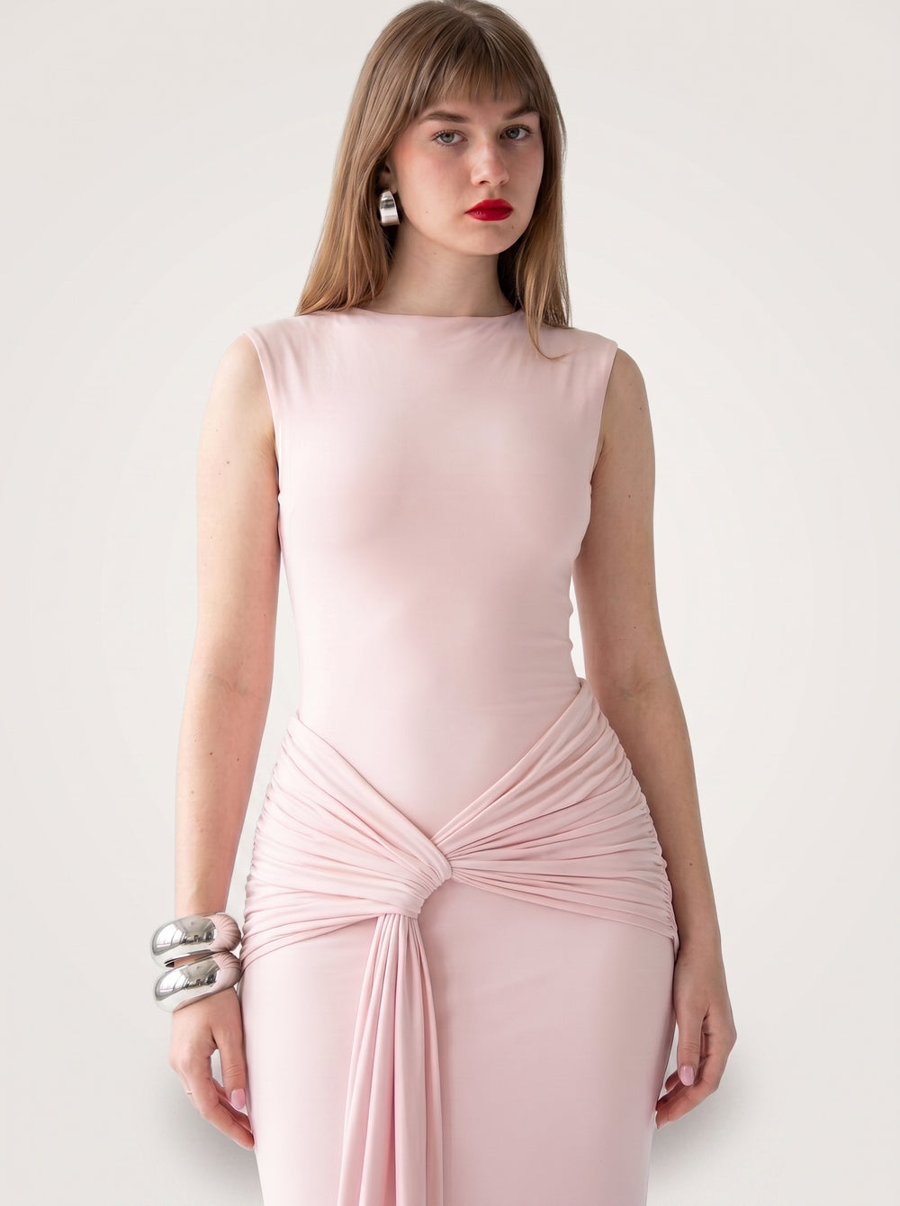 Blush Knot Maxi Dress in blush pink — knotted waist and open back, close-up of the knotted waist on model, VeroMarka