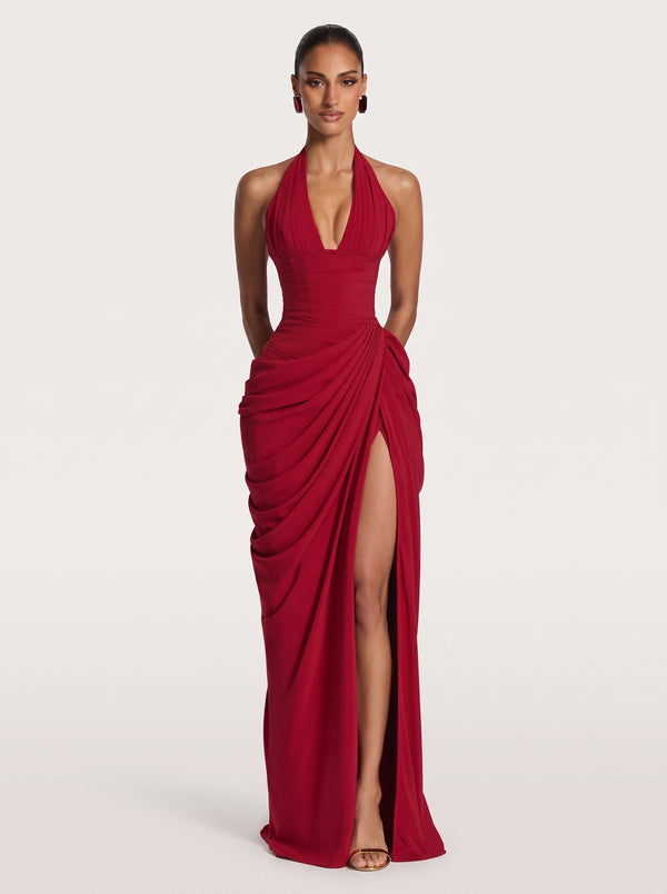 Draped Halter Slit Gown in red — plunging halter, corset back and draped slit skirt, front view on model, VeroMarka