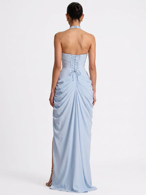 Draped Halter Slit Gown in sky blue — plunging halter, corset back and draped slit skirt, back view on model, VeroMarka