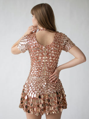 ÉclatShell Sequin Mock-Neck Mini Dress in rose gold — mock neck and sequin disc skirt, back view on model, VeroMarka