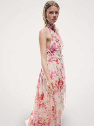 Floral Halter Backless Maxi Dress in pink floral, three-quarter view on model, VeroMarka
