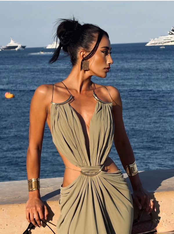 Gold Ring Cut-Out Maxi Dress in olive green, close-up of the waist cut-outs by the sea, VeroMarka