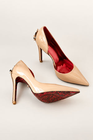 Pointed Stiletto Sword Pump in nude — gold dagger heel and red lace-print sole, nude pair with sole view, VeroMarka