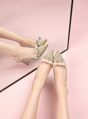Pointed Toe Kitten Slingback in beige — polka dot mesh toe and satin bow, worn in front of a mirror, VeroMarka