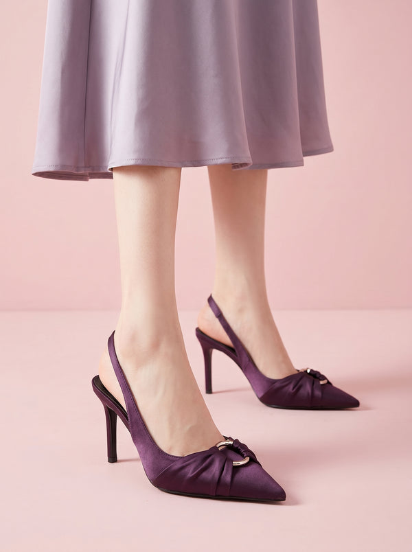 Pointed Toe Slingback Stiletto in purple — satin knot toe and ring detail, worn standing in a satin skirt, VeroMarka