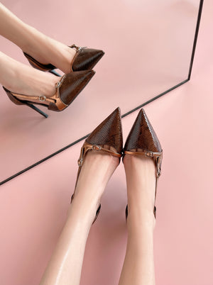 Pointed Toe Stiletto Heel in bronze brown, worn on feet in front of a mirror, VeroMarka