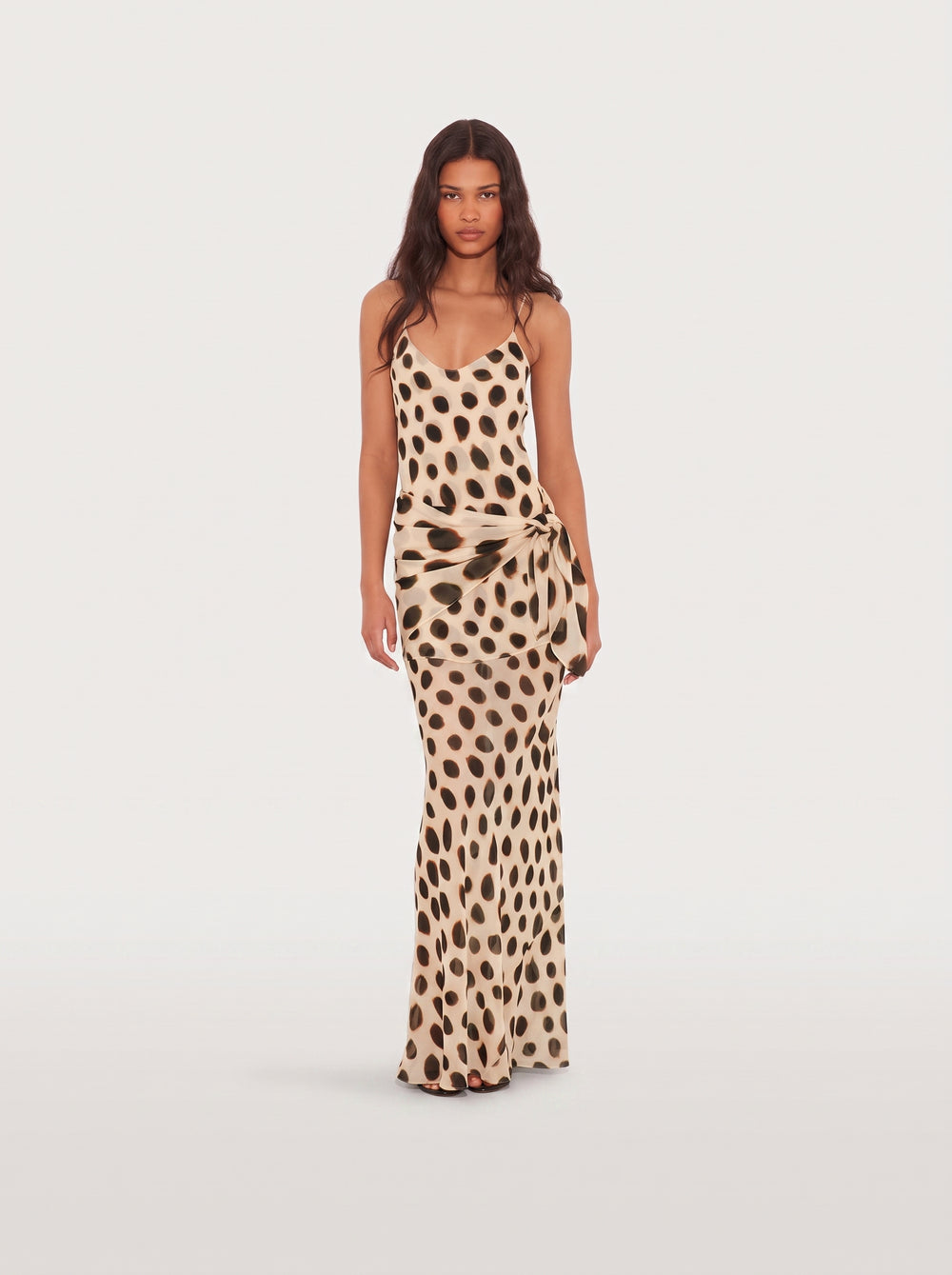 Polka Dot Satin Maxi Dress in cream and brown, posed against a pink and white wall, VeroMarka