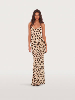 Polka Dot Satin Maxi Dress in cream and brown — slim straps, spot print and knotted hip, front view on model, VeroMarka
