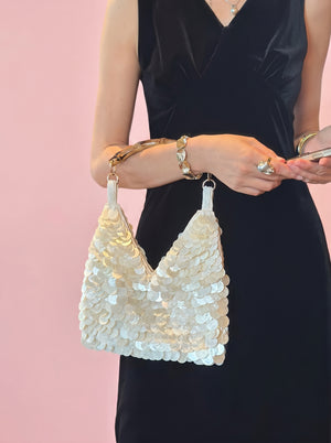 Sequin Bamboo Handle Hobo in ivory — shimmering sequins and bamboo handle, held on the forearm, VeroMarka