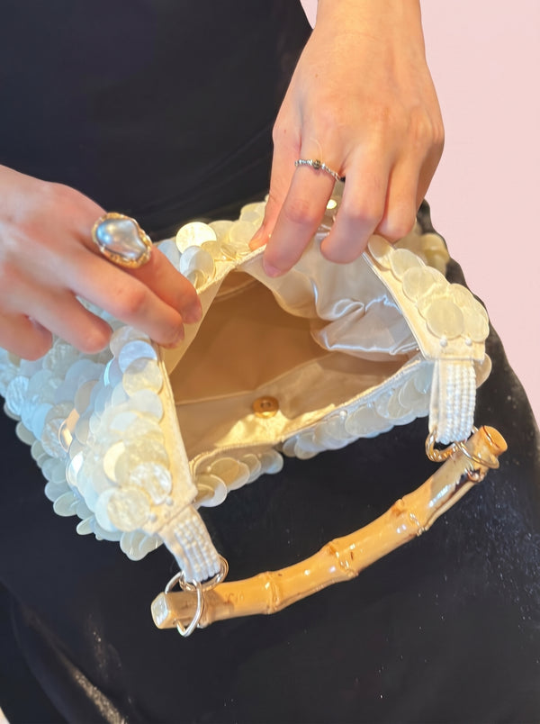 Sequin Bamboo Handle Hobo in ivory — shimmering sequins and bamboo handle, open to show the lined interior, VeroMarka