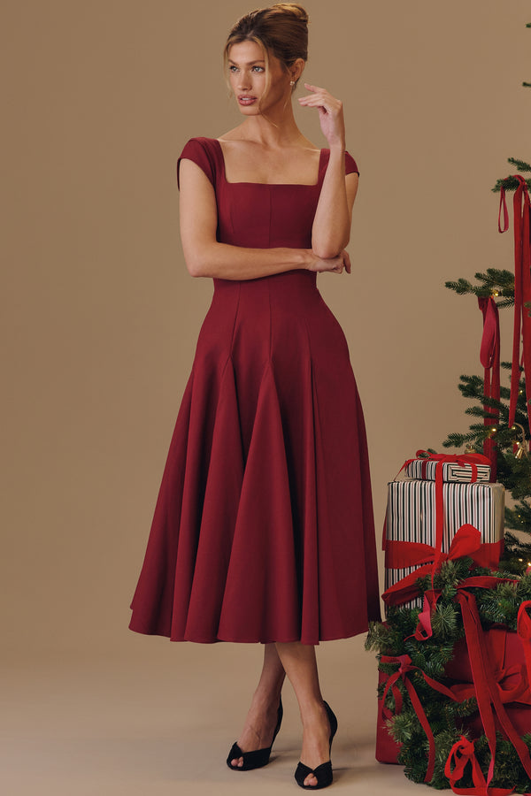 Square Neck A-Line Midi Dress in burgundy, standing beside a Christmas tree, VeroMarka