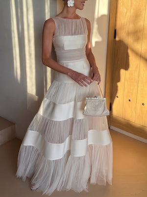 Tiered Tulle Satin Gown in ivory, styled in warm sunlight, three-quarter view, VeroMarka