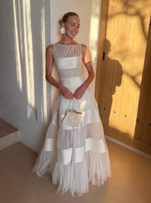 Tiered Tulle Satin Gown in ivory, styled in warm sunlight with a beaded clutch, VeroMarka